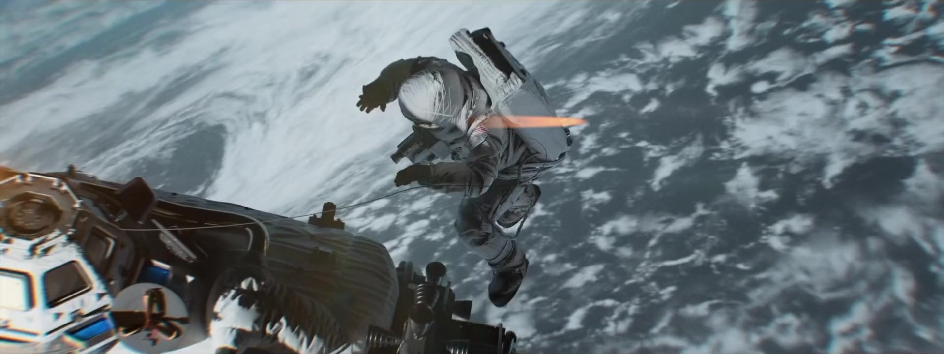 Astronaut floating in orbit above Earth with space station — Inside Job Films VFX